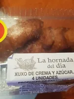 Xuxo de crema y azúcar