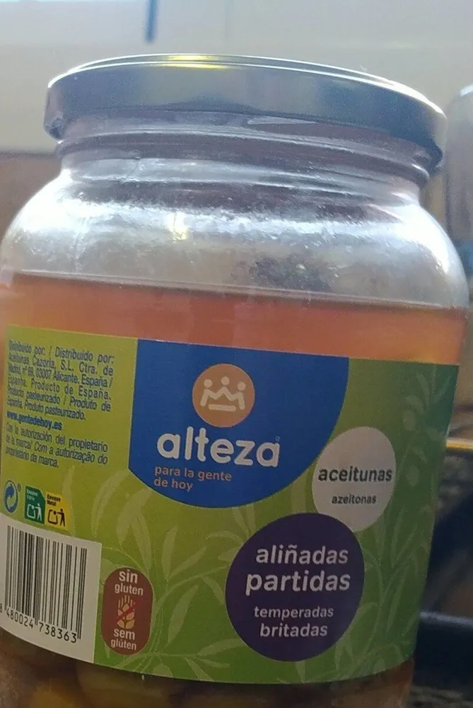Aceitunas aliñadas partidas