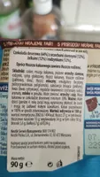 Czekolada deserowa (64%) z orzechami ziemnymi (13%), żelkami (12%) i rodzynkami (12%)