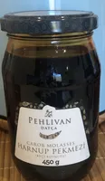 Carob molasses