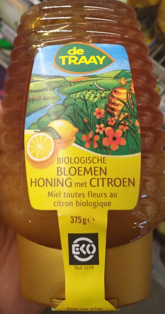 Biologische bloemen honing met citroen