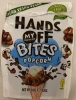 Bites popcorn