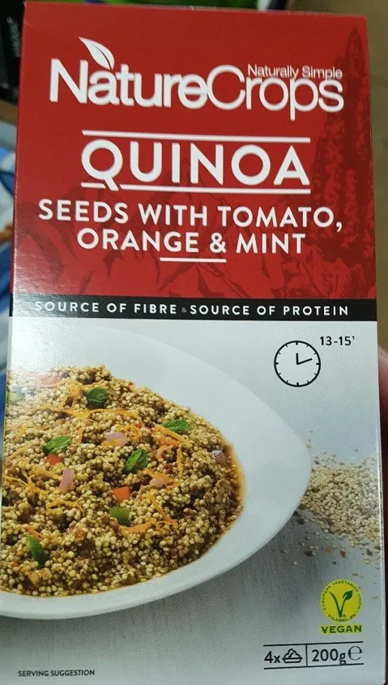 Quinoa seeds with tomato orange mint