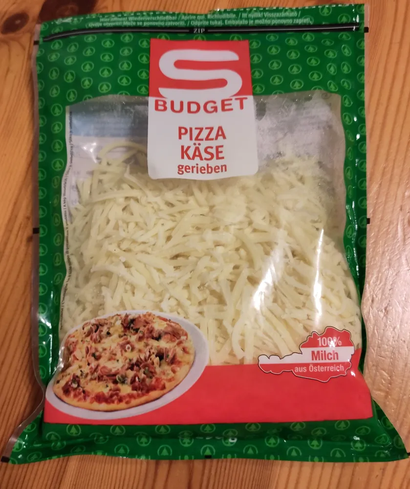 Pizzakäse gerieben