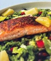 Jamaican took salmon and pineapple crash with black bean salsa