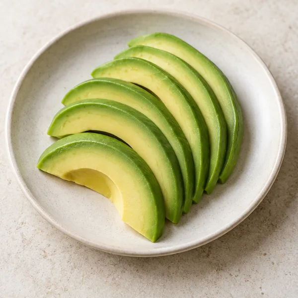 Illustration of avocado slices on a plate