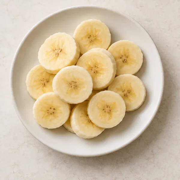Illustration of fresh banana slices on a plate