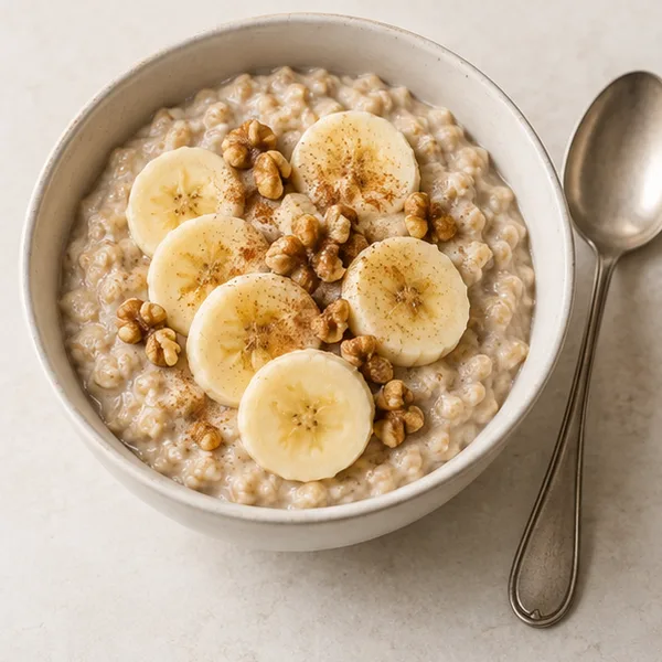 Illustration of porridge topped with banana and walnuts