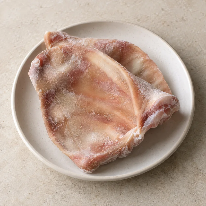 Illustration of pork fresh variety meats and by products ears frozen raw