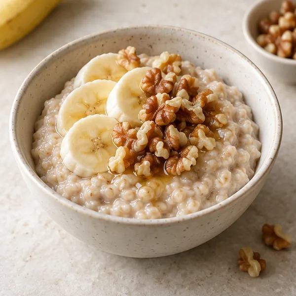 Illustration of porridge topped with banana and walnuts